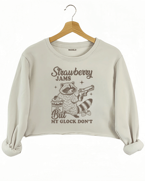 Ragglo women's beige crop sweatshirt with cute gray 'Strawberry Jams But MY GLOCK DON'T' raccoon graphic

