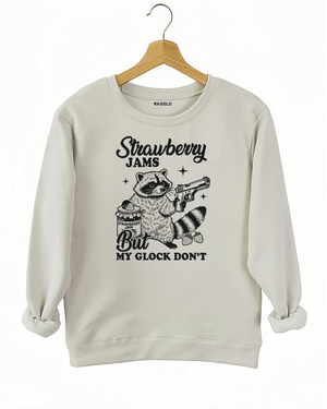 Ragglo women's beige sweatshirt with funny black 'Strawberry Jams But MY GLOCK DON'T' raccoon graphic

