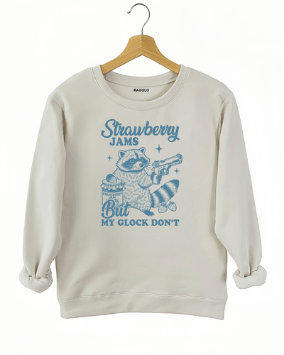 Ragglo women's beige sweatshirt with funny blue 'Strawberry Jams But MY GLOCK DON'T' raccoon graphic

