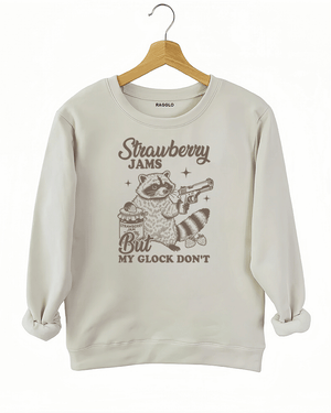 Ragglo women's beige sweatshirt with funny gray 'Strawberry Jams But MY GLOCK DON'T' raccoon graphic

