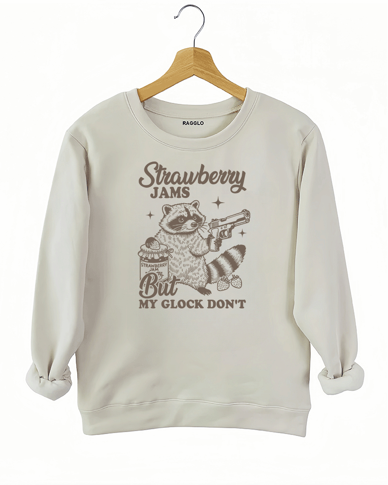 Ragglo women's beige sweatshirt with funny gray 'Strawberry Jams But MY GLOCK DON'T' raccoon graphic

