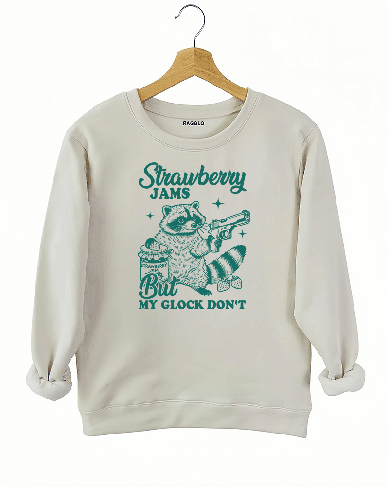 Ragglo women's beige sweatshirt with funny green 'Strawberry Jams But MY GLOCK DON'T' raccoon graphic

