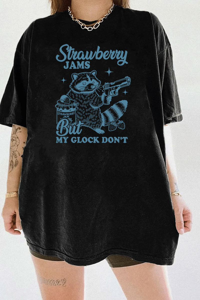 Ragglo women's black streetwear crop top with blue 'Strawberry Jams But MY GLOCK DON'T' raccoon graphic tee

