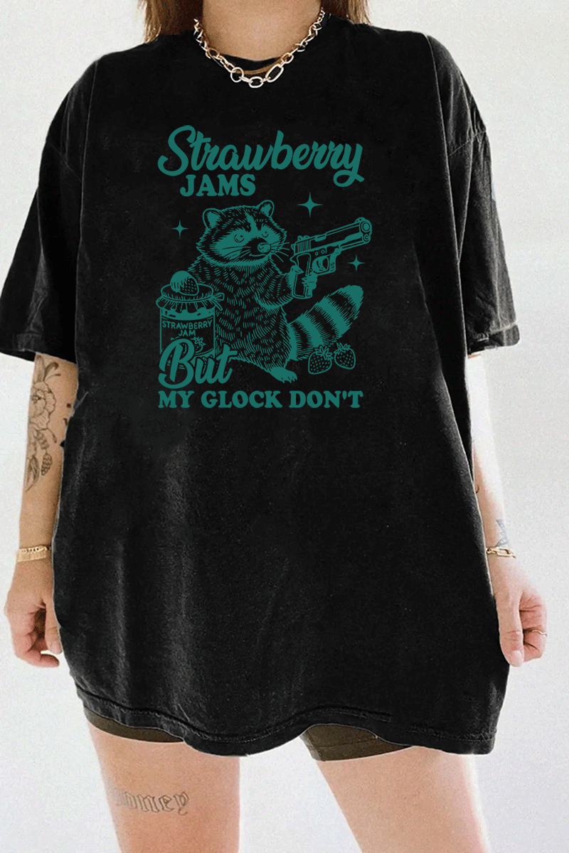 Ragglo women's black streetwear crop top with green 'Strawberry Jams But MY GLOCK DON'T' raccoon graphic tee

