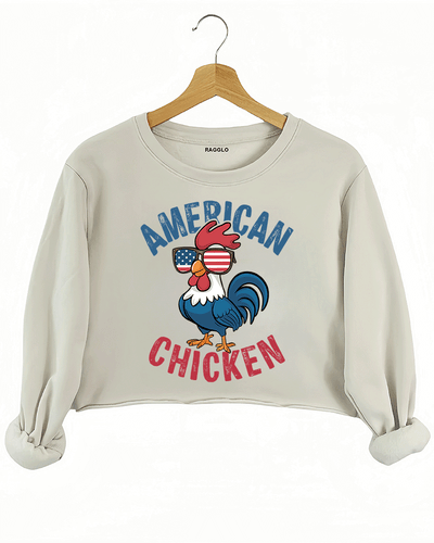 Ragglo beige crop sweatshirt featuring 'AMERICAN CHICKEN' text with a chicken wearing USA flag sunglasses, perfect for funny patriotic streetwear and showing USA pride.

