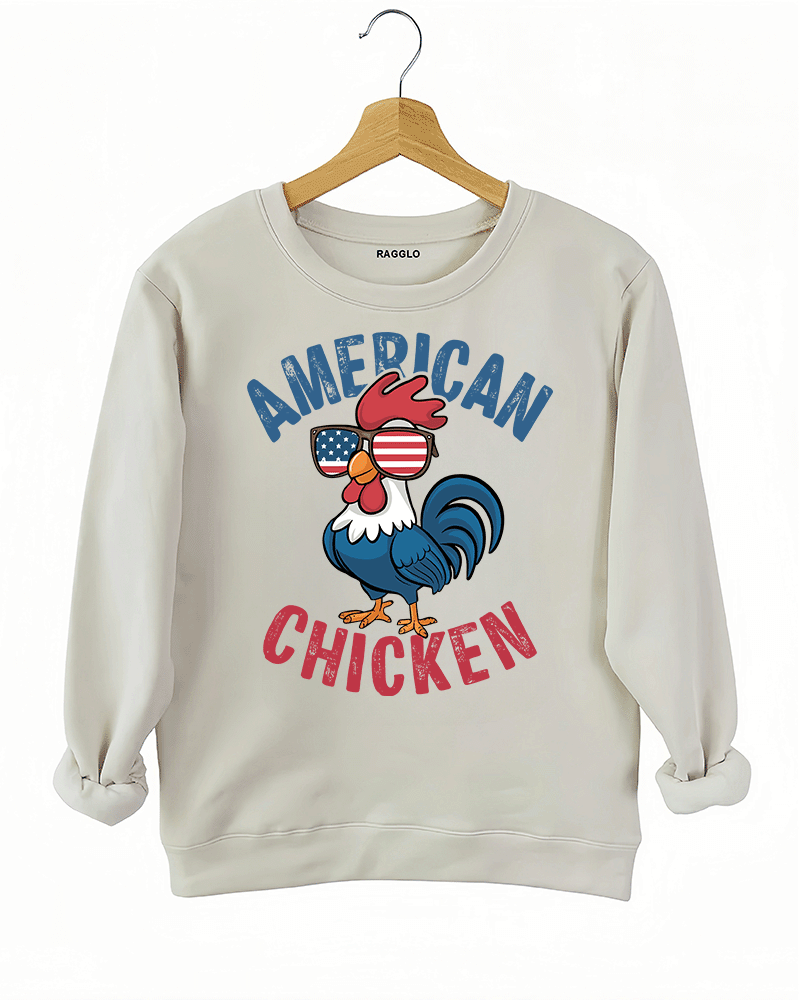Ragglo beige sweatshirt featuring 'AMERICAN CHICKEN' text with a chicken wearing USA flag sunglasses, perfect for funny patriotic streetwear and showing USA pride.

