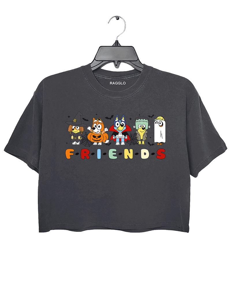 Ragglo dark gray crop top featuring five Bluey characters in Halloween costumes as a witch, vampire, Frankenstein, construction worker, and ghost, with 'F·R·I·E·N·D·S' text in a Friends-inspired font, perfect for cute Halloween streetwear for animation fans.

