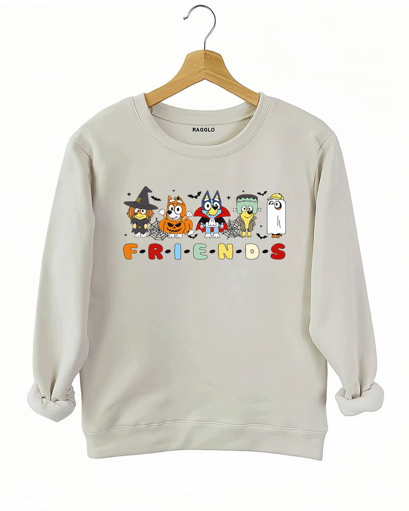 Ragglo beige sweatshirt featuring five Bluey characters in Halloween costumes as a witch, vampire, Frankenstein, construction worker, and ghost, with 'F·R·I·E·N·D·S' text in a Friends-inspired font, perfect for cute Halloween streetwear for animation fans.

