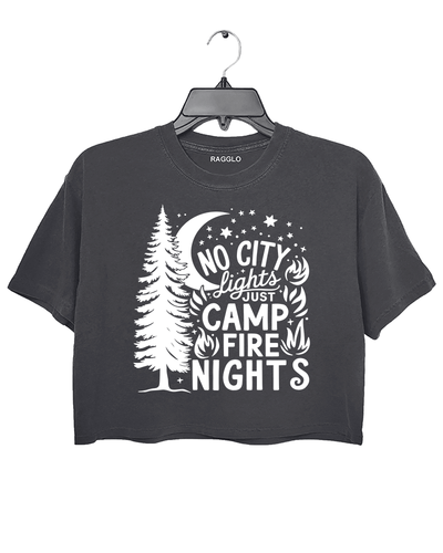 Ragglo dark gray crop top featuring a pine tree, moon, stars, and campfire elements, with 'NO CITY LIGHTS JUST CAMP FIRE NIGHTS' text, perfect for outdoor camping streetwear for nature lovers.

