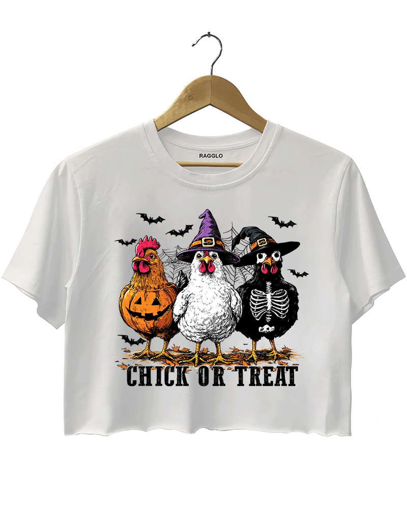 Ragglo white crop top featuring three chickens in Halloween costumes with pumpkins, witch hats, and skeleton designs, accented by bats and spiderwebs, with 'CHICK OR TREAT' text, perfect for funny Halloween streetwear.

