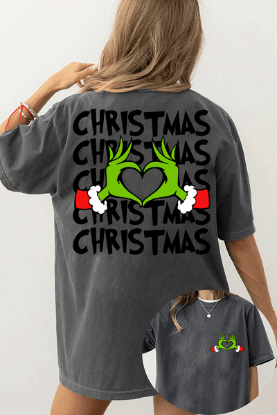 Ragglo dark gray women's T-Shirt featuring Grinch hands making a heart shape with Santa cuffs on the front, and larger Grinch hands with 'Christmas' text repeated around them on the back, in a funny holiday graphic design.