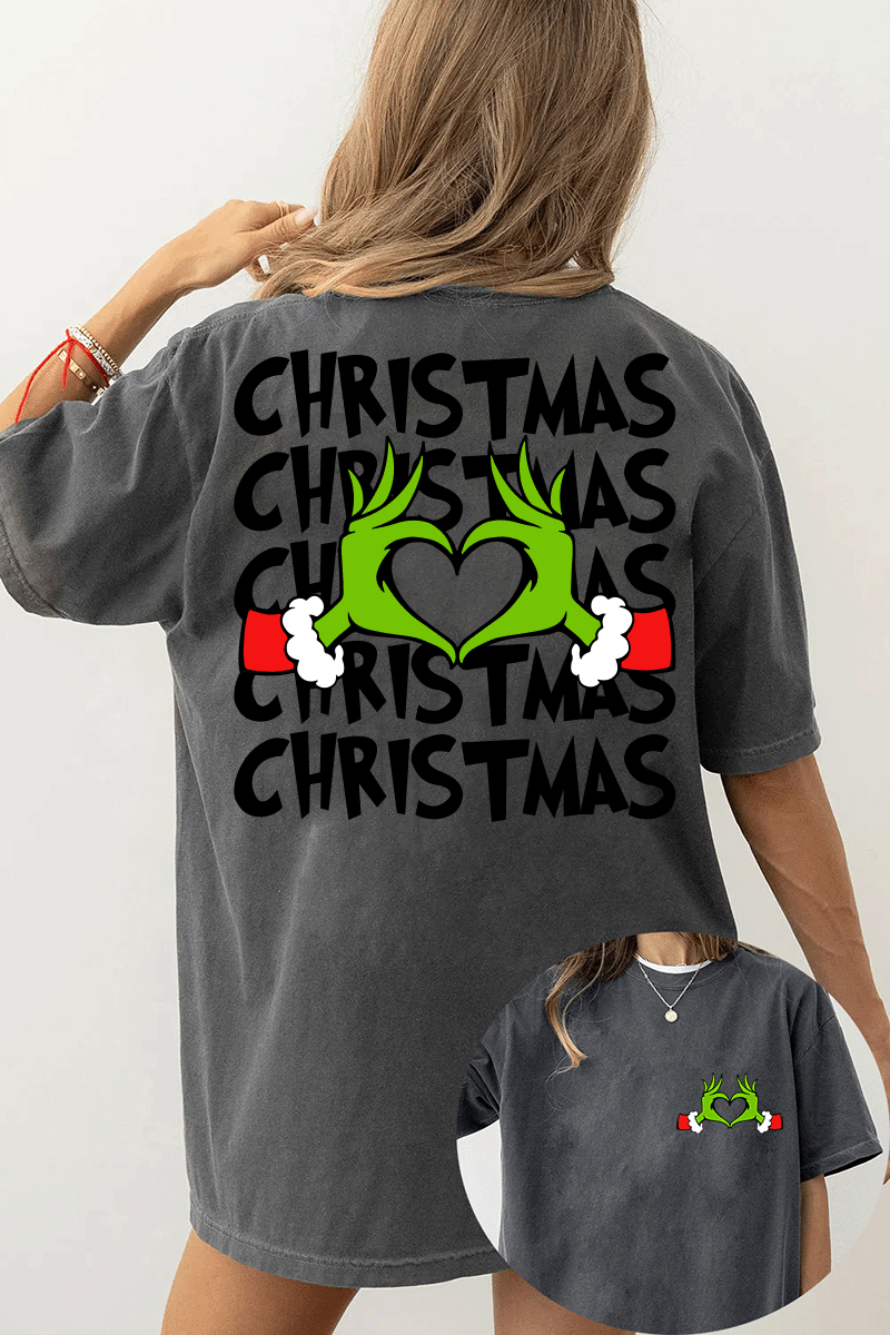 Ragglo dark gray women's T-Shirt featuring Grinch hands making a heart shape with Santa cuffs on the front, and larger Grinch hands with 'Christmas' text repeated around them on the back, in a funny holiday graphic design.