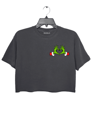 Ragglo dark gray women's crop top front featuring Grinch hands making a heart shape with Santa cuffs in a playful Christmas design.