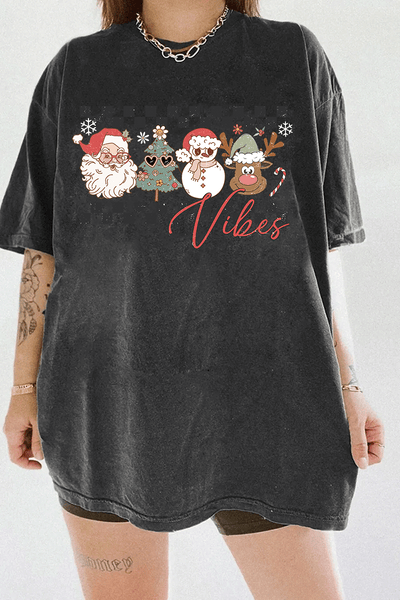 Ragglo dark gray T-shirt with "Vibes" text and Christmas graphic featuring Santa, snowman, and reindeer, showcasing a festive holiday theme with a checkered background.

