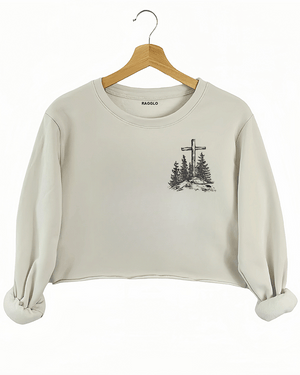 Ragglo beige women's crop sweatshirt front featuring a minimalist design with a cross and trees in a faith-inspired style.