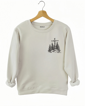 Ragglo beige women's sweatshirt front featuring a minimalist design with a cross and trees in a faith-inspired style.