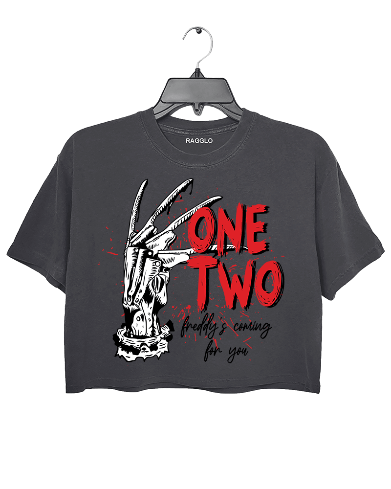 Ragglo dark gray women's crop top with Freddy Krueger claw graphic and "One Two Freddy's Coming For You" text, inspired by A Nightmare on Elm Street horror theme.

