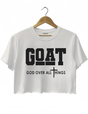 Ragglo white crop top with "GOAT God Over All Things" text and cross symbol in white, featuring a Christian faith-inspired design.

