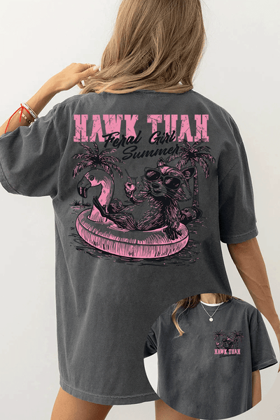Ragglo dark gray T-shirt front and back view, featuring a raccoon in sunglasses on a flamingo float with 'HAWK TUAH FERAL GIRL SUMMER' text and palm trees, perfect for playful vacation streetwear.

