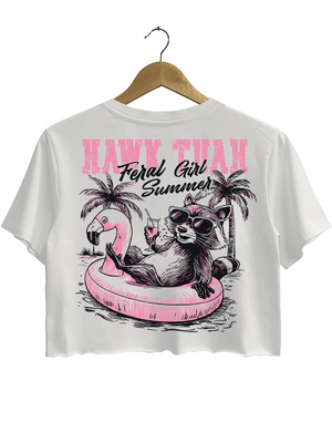 Ragglo white crop top back view featuring a raccoon in sunglasses on a flamingo float with a drink and palm trees, perfect for fun vacation vibes and streetwear.

