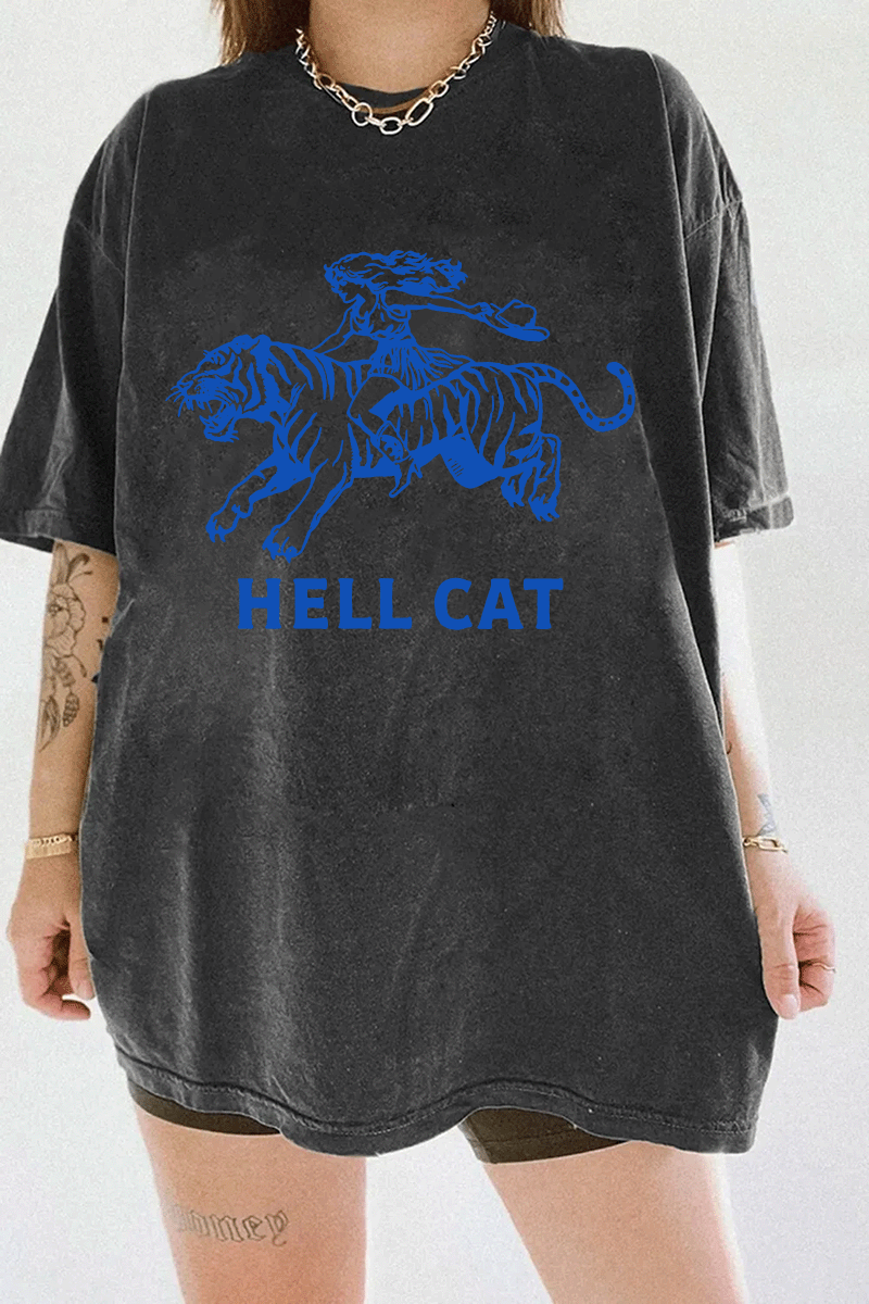Ragglo dark gray tee featuring 'HELL CAT' text in blue with a graphic of a woman riding a tiger, perfect for bold streetwear and fierce, rebellious vibes.

