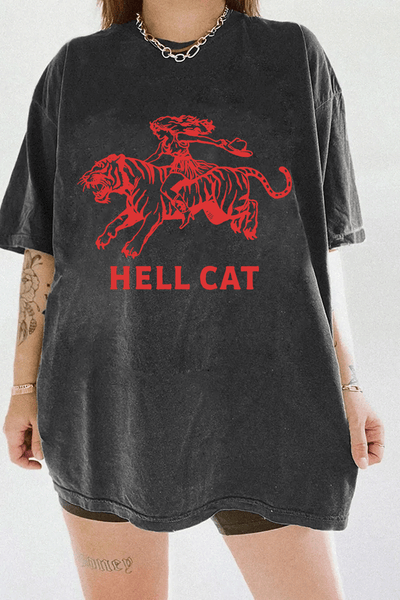 Ragglo dark gray tee featuring 'HELL CAT' text in red with a graphic of a woman riding a tiger, perfect for bold streetwear and fierce, rebellious vibes.

