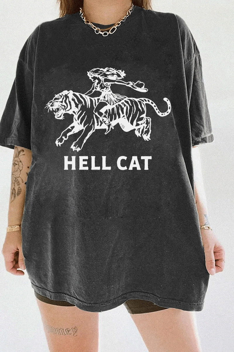 Ragglo dark gray tee featuring 'HELL CAT' text in white with a graphic of a woman riding a tiger, perfect for bold streetwear and fierce, rebellious vibes.

