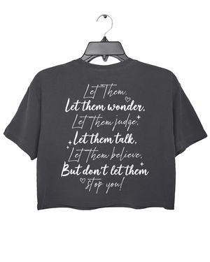 Ragglo dark gray women's crop top back featuring the motivational text 'Let Them Wonder, Let Them Judge, Let Them Talk, Let Them Believe, But Don’t Let Them Stop You!' with a heart in an inspiring graphic design.