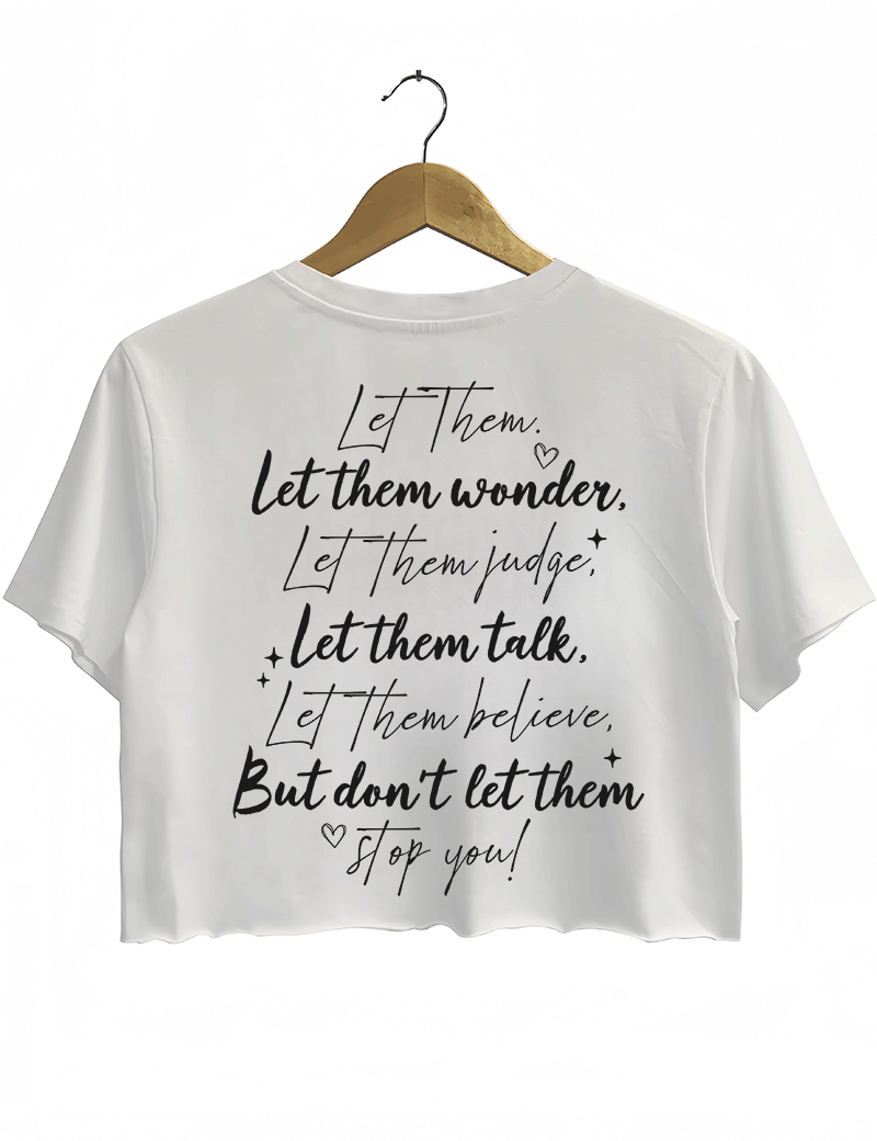 Ragglo white women's Crop Top back featuring the motivational text 'Let Them Wonder, Let Them Judge, Let Them Talk, Let Them Believe, But Don’t Let Them Stop You!' with a heart in an inspiring graphic design.