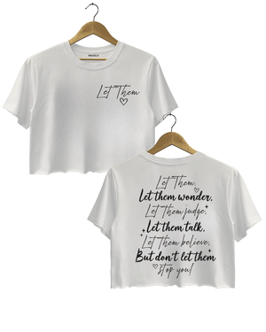 Ragglo white women's crop top featuring 'Let Them' with a heart on the front and the motivational text 'Let Them Wonder, Let Them Judge, Let Them Talk, Let Them Believe, But Don’t Let Them Stop You!' with a heart on the back, in an empowering graphic design.