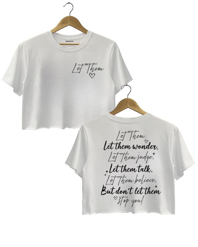 Ragglo white women's crop top featuring 'Let Them' with a heart on the front and the motivational text 'Let Them Wonder, Let Them Judge, Let Them Talk, Let Them Believe, But Don’t Let Them Stop You!' with a heart on the back, in an empowering graphic design.