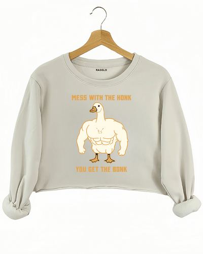 Ragglo beige crop sweatshirt with muscular goose graphic and "Mess With The Honk You Get The Bonk" text, featuring a humorous and bold animal meme theme.

