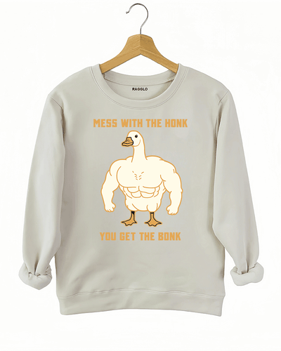 Ragglo beige sweatshirt with muscular goose graphic and "Mess With The Honk You Get The Bonk" text, featuring a humorous and bold animal meme theme.

