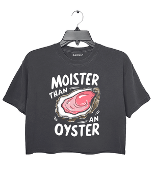 Ragglo dark gray crop top featuring 'MOISTER THAN AN OYSTER' text with an oyster graphic, perfect for cheeky streetwear and playful, flirty vibes.

