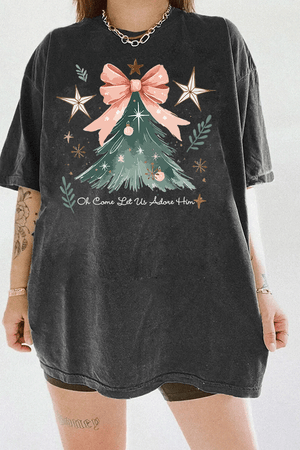 Ragglo dark gray tee featuring a Christmas tree with a pink bow, stars, snowflakes, and branches, with 'Oh Come Let Us Adore Him' text, perfect for religious Christmas streetwear.





