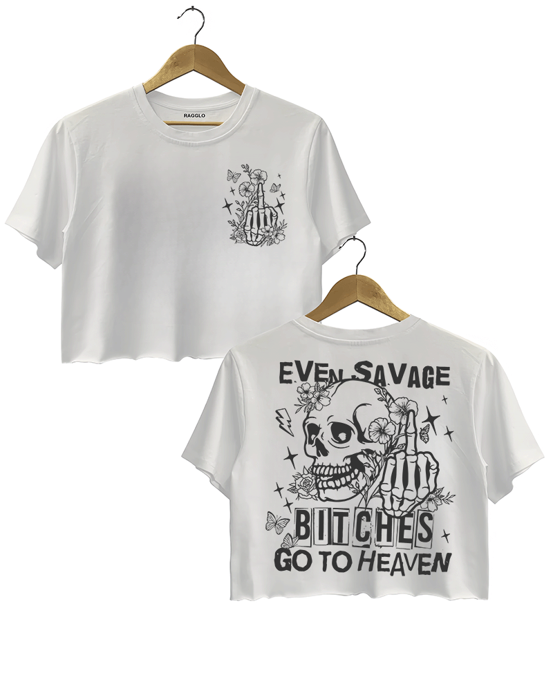 Ragglo white crop top featuring front and back views: the front shows a skeleton hand with a middle finger gesture surrounded by flowers, butterflies, and stars; the back displays a skull with a skeleton hand giving a middle finger, surrounded by flowers, butterflies, and stars, with 'EVEN SAVAGE BITCHES GO TO HEAVEN' text, perfect for bold and humorous streetwear.

