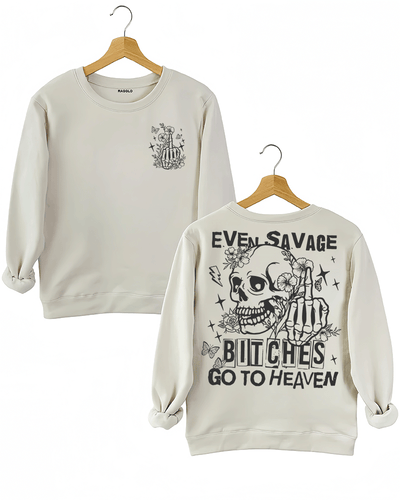 Ragglo beige sweatshirt featuring front and back views: the front shows a skeleton hand with a middle finger gesture surrounded by flowers, butterflies, and stars; the back displays a skull with a skeleton hand giving a middle finger, surrounded by flowers, butterflies, and stars, with 'EVEN SAVAGE BITCHES GO TO HEAVEN' text, perfect for bold and humorous streetwear.

