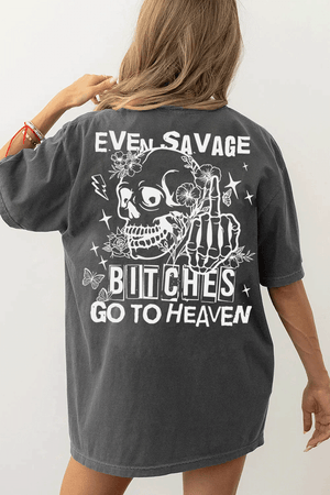 Ragglo dark gray tee back view featuring a skull with a skeleton hand giving a middle finger, surrounded by flowers, butterflies, and stars, with 'EVEN SAVAGE BITCHES GO TO HEAVEN' text, perfect for humorous streetwear.

