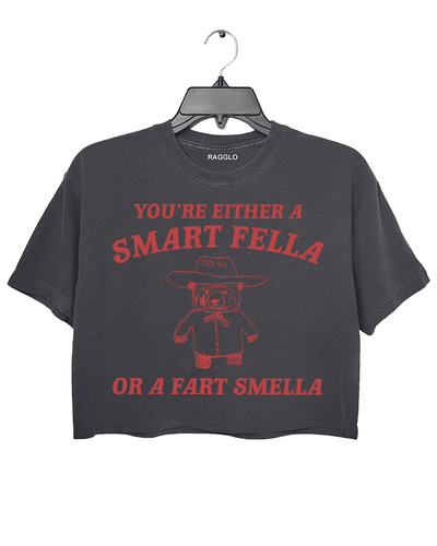 Ragglo dark gray crop top featuring 'YOU’RE EITHER A SMART FELLA OR A FART SMELLA' text with a bear in a cowboy hat, perfect for casual streetwear and humorous everyday wear.


