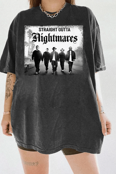 Ragglo dark gray T-shirt with "Straight Outta Nightmares" graphic featuring five figures on a road, blending horror movie and hip-hop culture themes.


