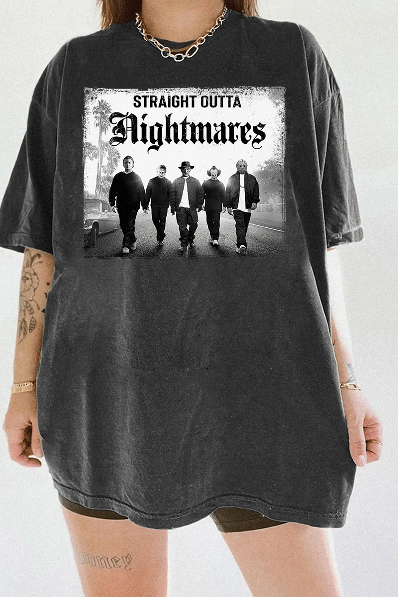 Ragglo dark gray T-shirt with "Straight Outta Nightmares" graphic featuring five figures on a road, blending horror movie and hip-hop culture themes.

