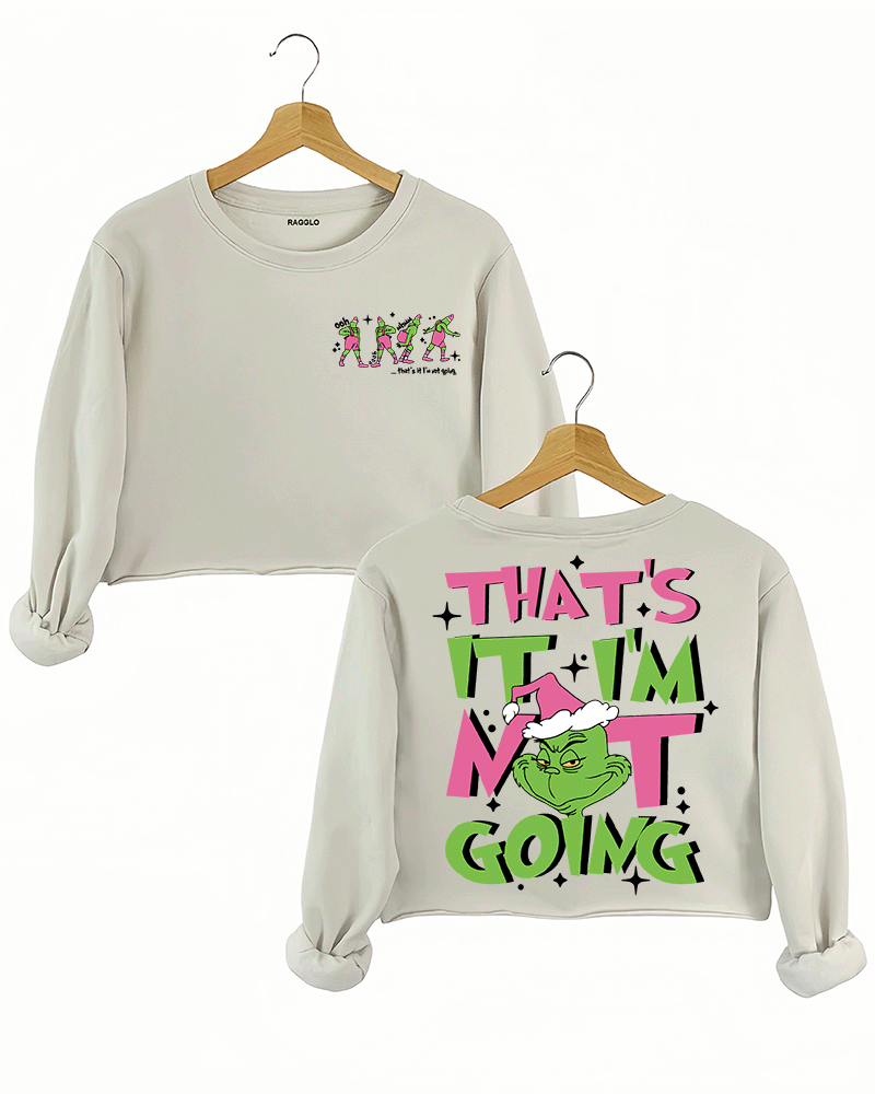 Ragglo beige women's crop sweatshirt featuring three Grinch characters with Santa hats on the front with 'Oh, That’s It I’m Trippin'' text, and a large Grinch with Santa hat on the back with 'That’s It I’m Not Going' text, in a humorous Christmas graphic design.