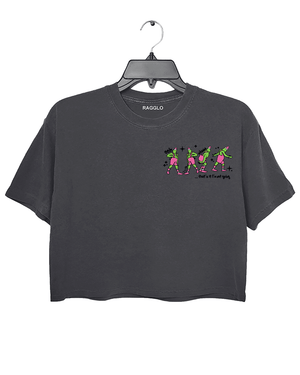 Ragglo dark gray women's crop top front featuring three Grinch characters with Santa hats and the text 'Oh, That’s It I’m Trippin'' in a funny Christmas graphic design.