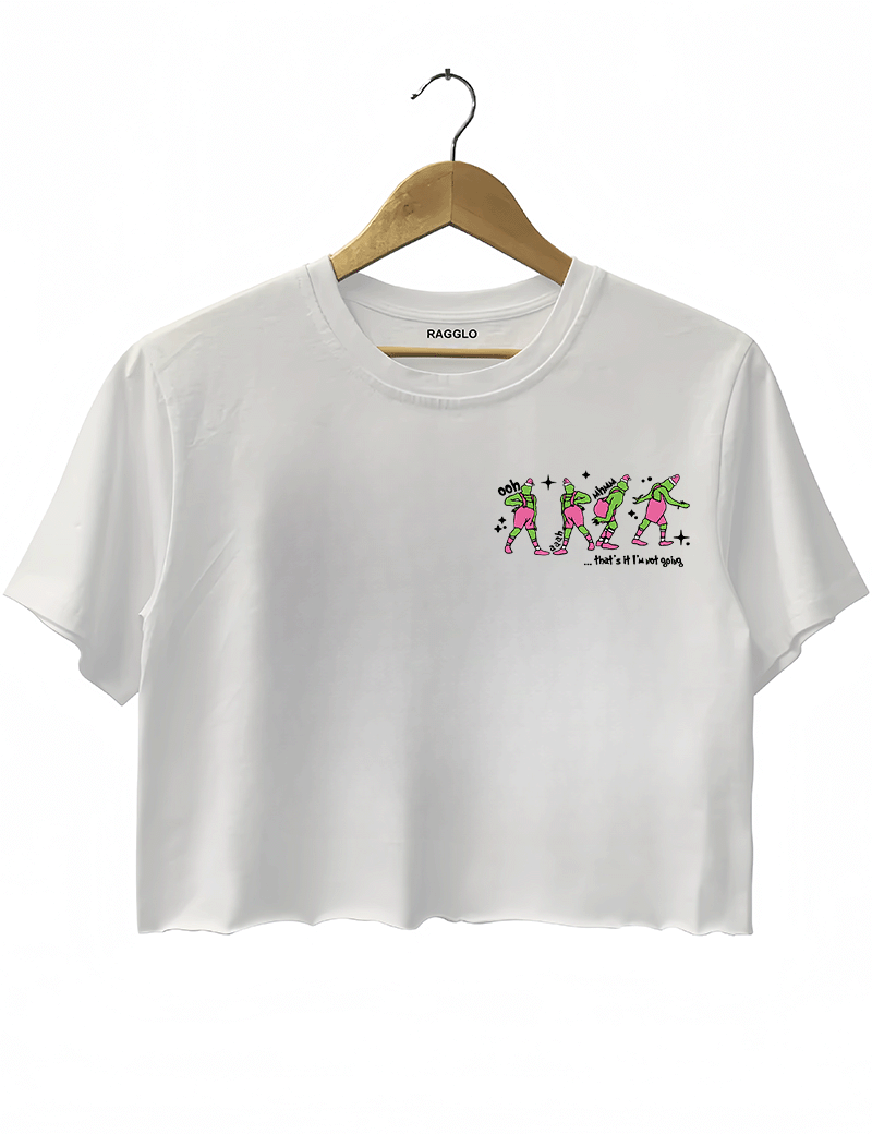 Ragglo white women's crop top front featuring three Grinch characters with Santa hats and the text 'Oh, That’s It I’m Trippin'' in a funny Christmas graphic design.