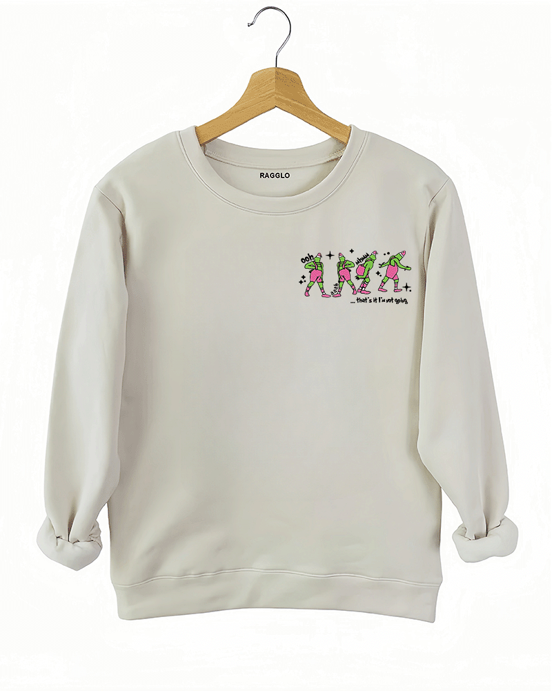 Ragglo beige women's sweatshirt front featuring three Grinch characters with Santa hats and the text 'Oh, That’s It I’m Trippin'' in a funny Christmas graphic design.