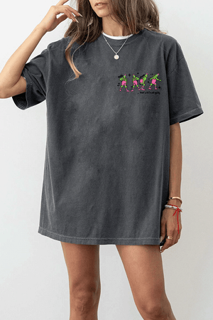 Ragglo dark gray women's T-Shirt front featuring three Grinch characters with Santa hats and the text 'Oh, That’s It I’m Trippin'' in a funny Christmas graphic design.