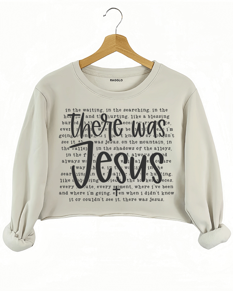 Ragglo beige crop sweatshirt with "There Was Jesus" text in white, featuring a Christian faith-inspired design with spiritual lyrics.

