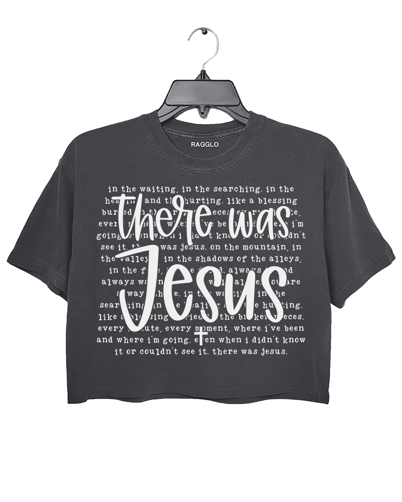 Ragglo dark gray crop top with "There Was Jesus" text in white, featuring a Christian faith-inspired design with spiritual lyrics.

