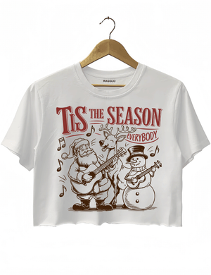 Ragglo white crop top featuring Santa, a reindeer, and a snowman playing guitars with musical notes and 'TIS THE SEASON EVERYBODY' text, perfect for festive Christmas streetwear with a musical vibe.

