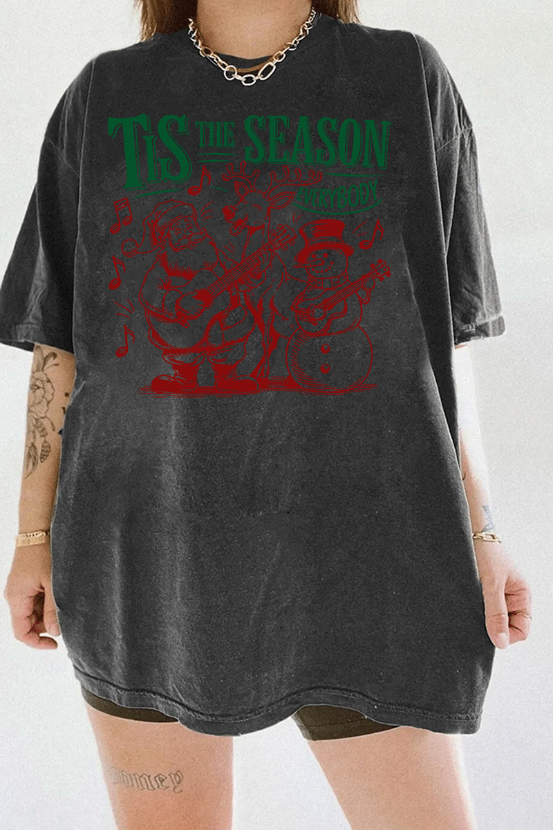 Ragglo dark gray tee featuring Santa, a reindeer, and a snowman playing guitars with musical notes and 'TIS THE SEASON EVERYBODY' text, perfect for festive Christmas streetwear with a musical vibe.

